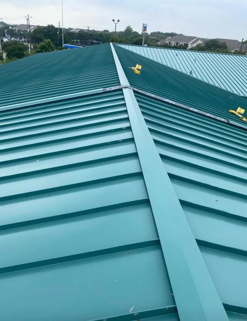 Green commercial metal roof ridge and valley for Metal Roof Repair in Blackfoot